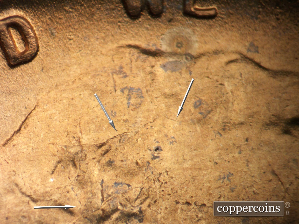 Die-stage B marker on 1953S•1MM•049 showing Die cracks in hair.