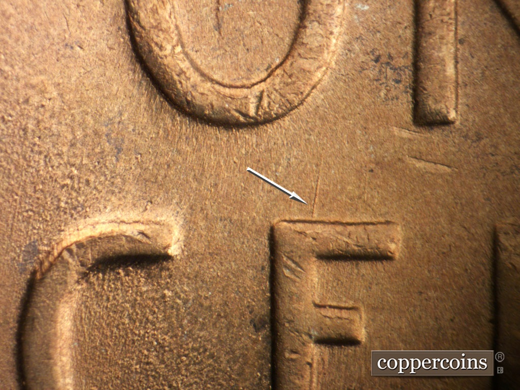 Die-stage B marker on 1953S•1MM•049 showing NNE die scratch from top of E in CENT.