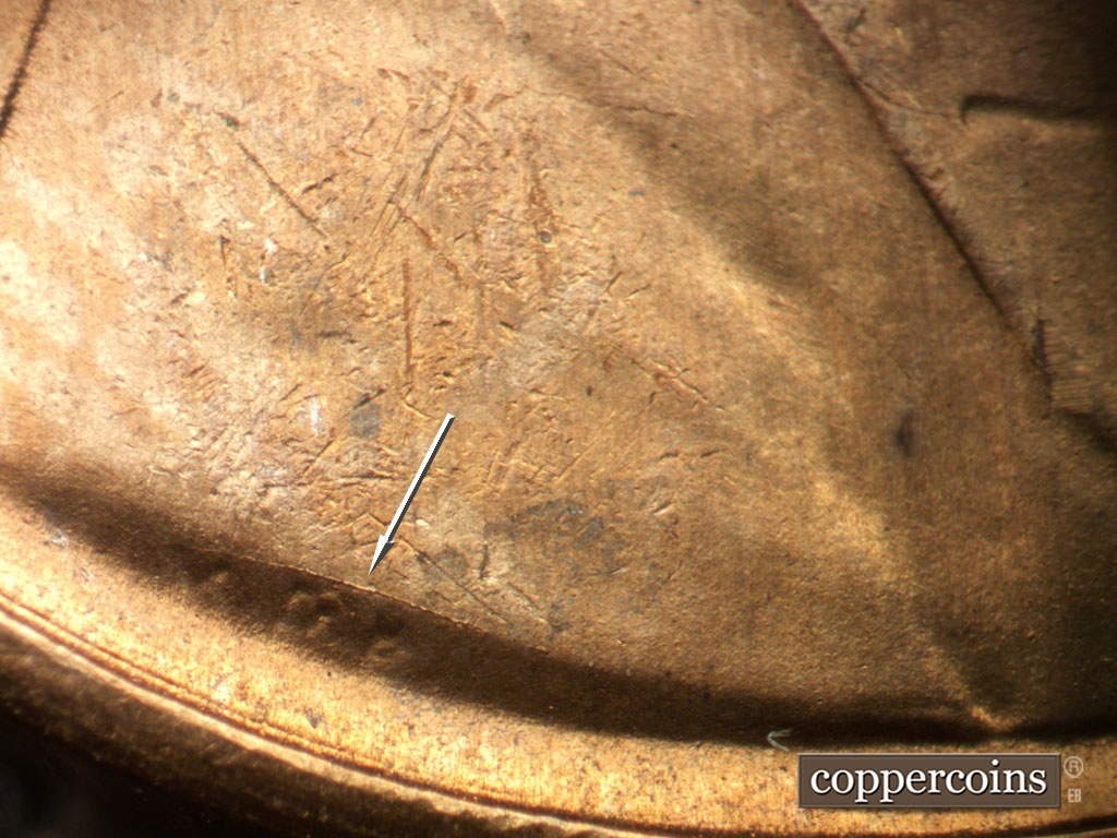 Die-stage B marker on 1953S•1MM•050 showing Die crack over VDB.