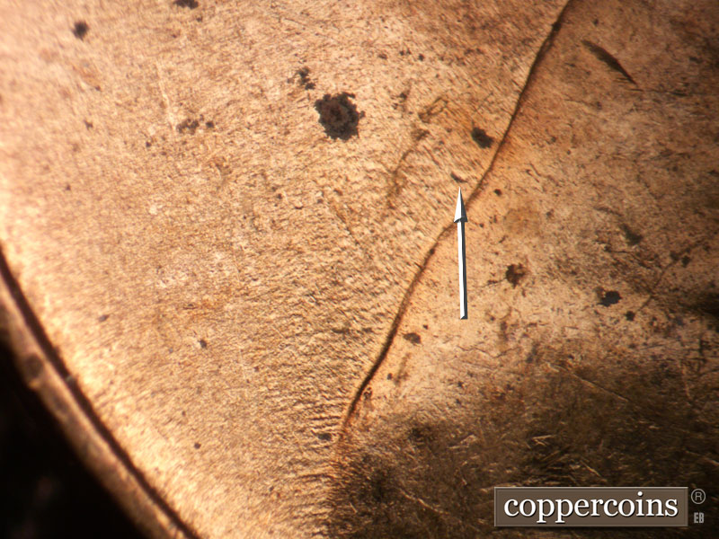 Die-stage B marker on 1954D•1DO•006 (1954 Doubled Die Obverse).