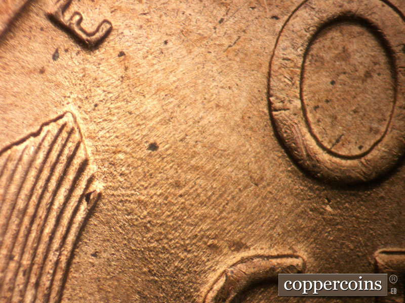 Die-stage B marker on 1954D•1DO•006 (1954 Doubled Die Obverse).
