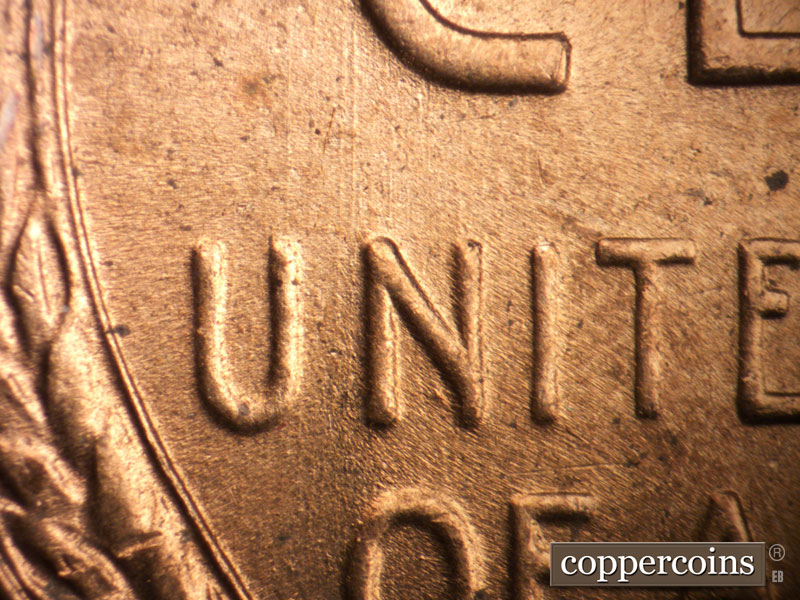 Die-stage B marker on 1954D•1DO•006 (1954 Doubled Die Obverse).