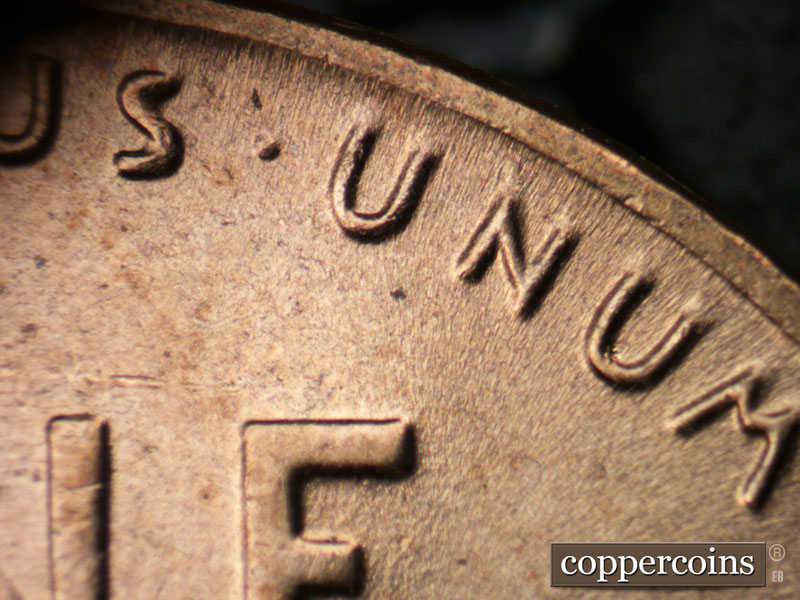 Die-stage B marker on 1954D•1DR•001 (1954 Doubled Die Reverse).