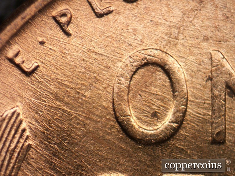 Die-stage B marker on 1954D•1MM•004 (1954 Repunched Mint Mark).