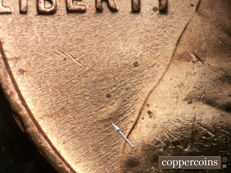 Die-stage B marker on 1954D•1MM•011 (1954 Repunched Mint Mark).