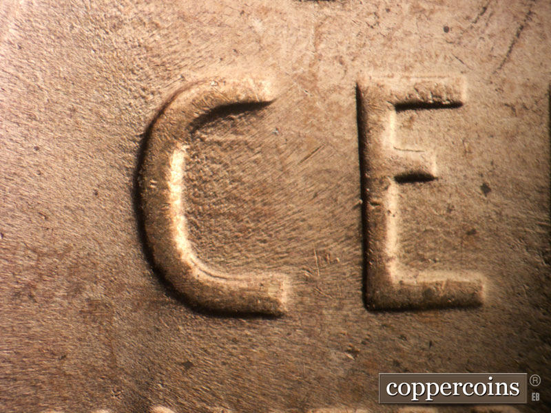 Die-stage B marker on 1954D•1MM•011 (1954 Repunched Mint Mark).