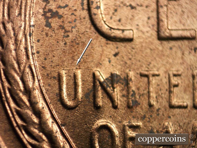 Die-stage B marker on 1954D•1MM•032 (1954 Repunched Mint Mark).