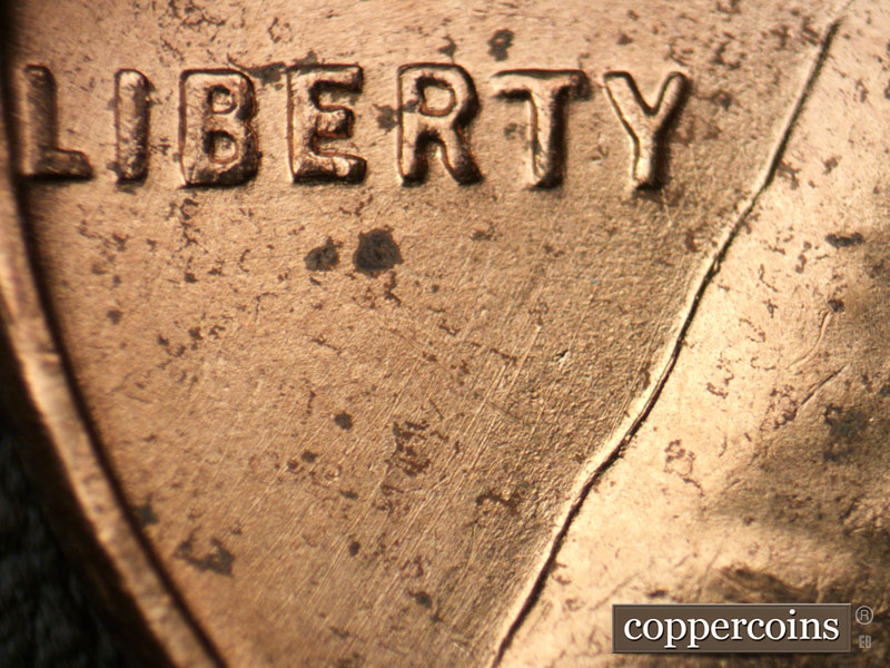 Die-stage B marker on 1954D•1MM•037 (1954 Repunched Mint Mark).