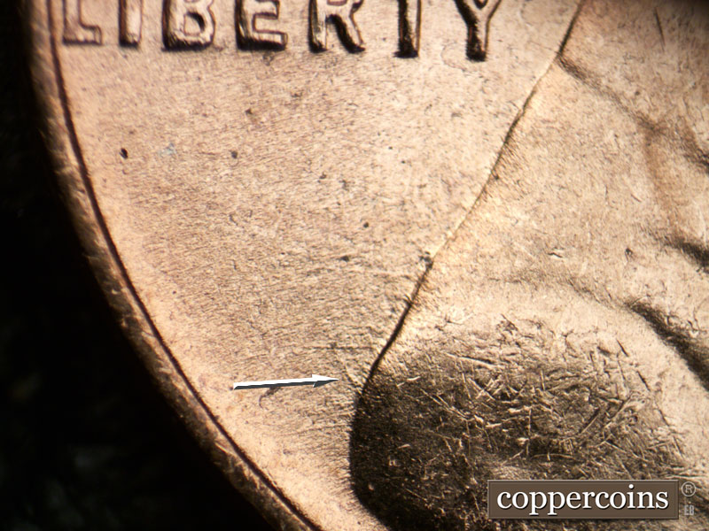 Die-stage B marker on 1954D•1MM•038 (1954 Repunched Mint Mark).