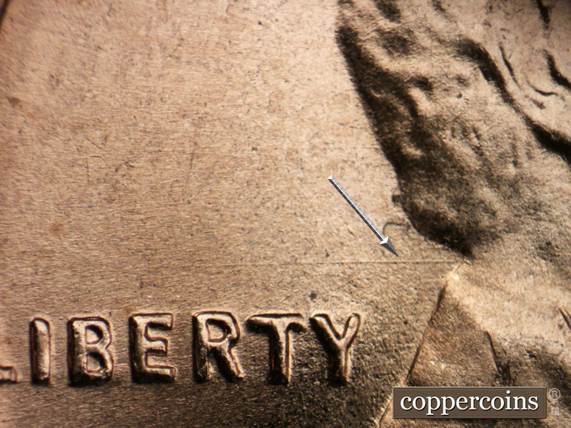 Die-stage B marker on 1954D•1MM•038 (1954 Repunched Mint Mark).