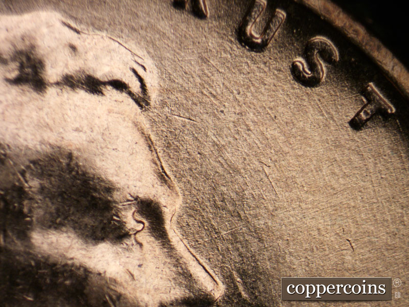 Die-stage B marker on 1954D•1MM•038 (1954 Repunched Mint Mark).