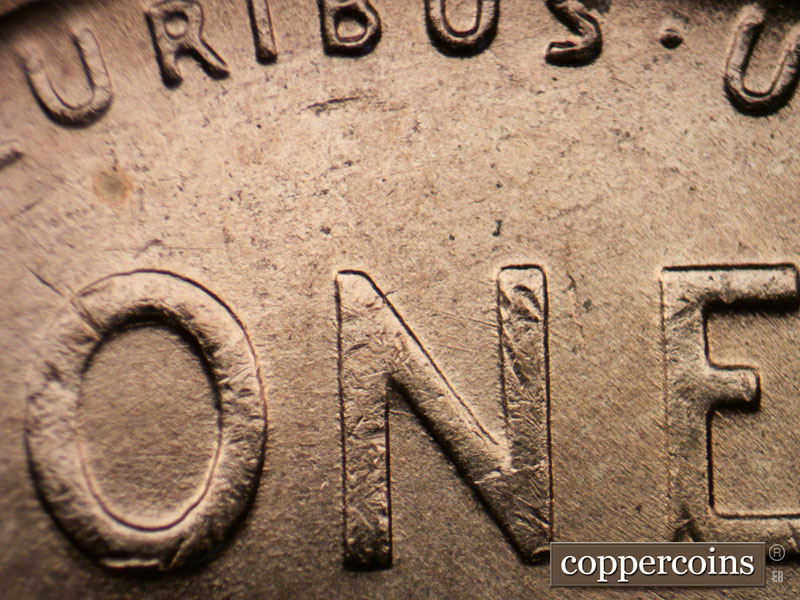 Die-stage B marker on 1954D•1MM•038 (1954 Repunched Mint Mark).