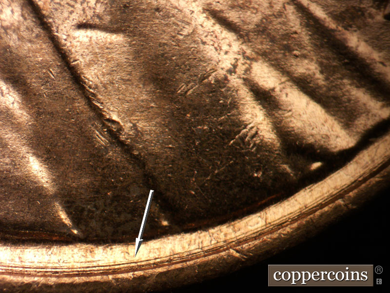 Die-stage B marker on 1954D•1MM•044 (1954 Repunched Mint Mark).