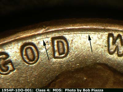 Die-stage B marker on 1954P•1DO•001 showing Concentric die scratch between rim and top of IN GO WE.