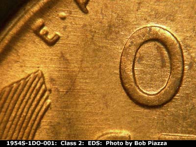 Die-stage A marker on 1954S•1DO•001 (1954 Doubled Die Obverse).