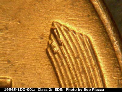 Die-stage A marker on 1954S•1DO•001 (1954 Doubled Die Obverse).