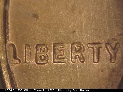 Die-stage C marker on 1954S•1DO•001 (1954 Doubled Die Obverse).