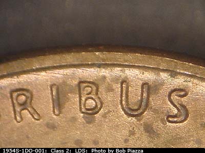 Die-stage C marker on 1954S•1DO•001 (1954 Doubled Die Obverse).