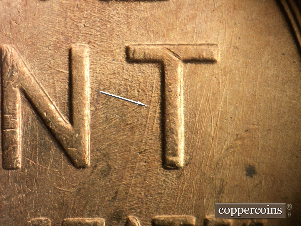 Die-stage B marker on 1954S•1DO•002 showing SSW die scratches from T in CENT.