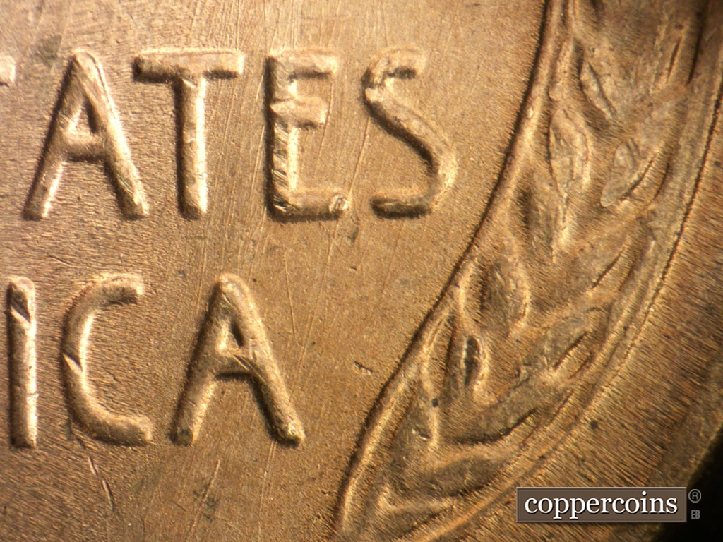 Die-stage B marker on 1954S•1DO•002 showing SSW die scratches through TES in STATES.