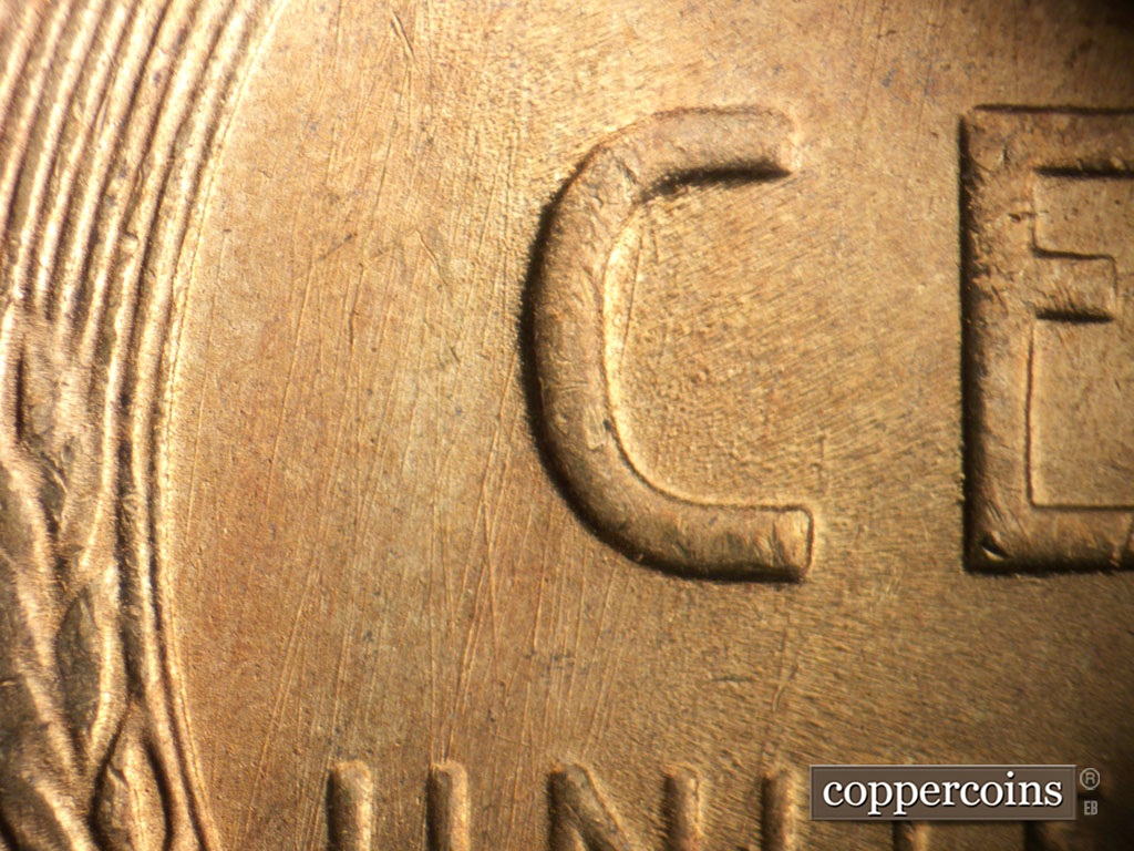 Die-stage B marker on 1954S•1DO•002 showing Die scratches in C of CENT.