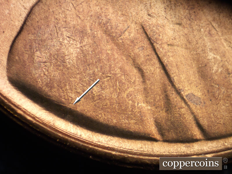 Die-stage B marker on 1954S•1DO•003 (1954 Doubled Die Obverse).