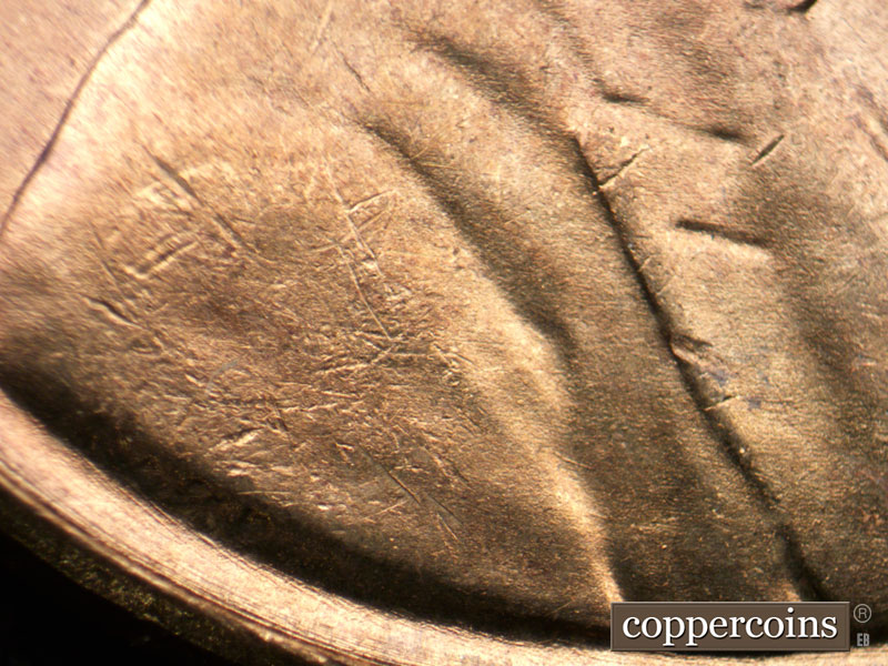 Die-stage B marker on 1954S•1DO•005 (1954 Doubled Die Obverse).