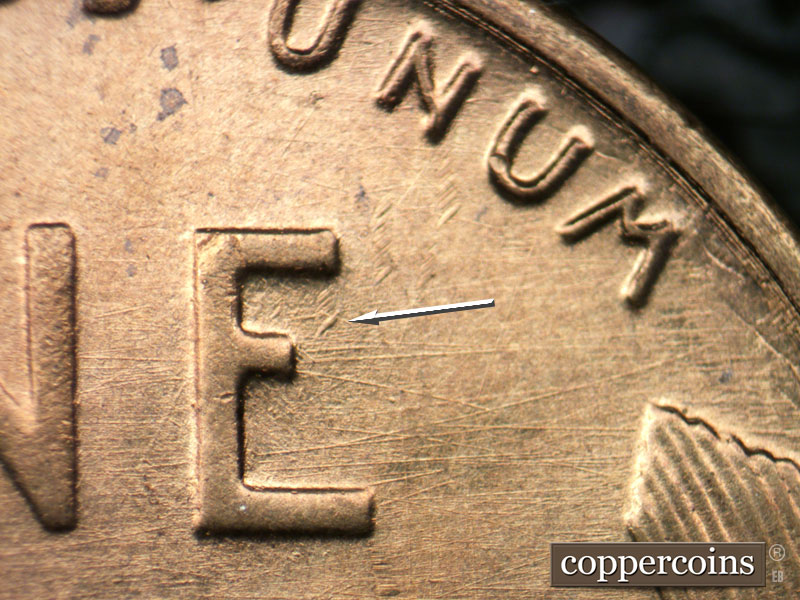 Die-stage B marker on 1954S•1DO•005 (1954 Doubled Die Obverse).