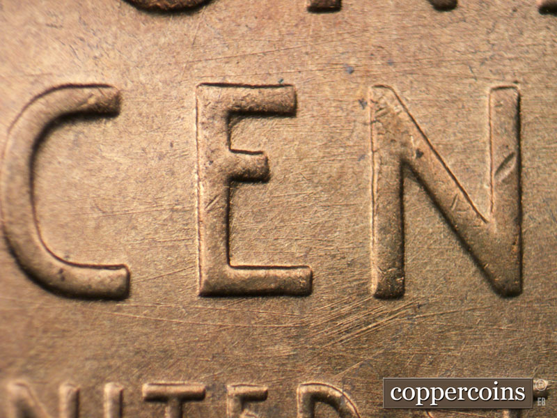 Die-stage B marker on 1954S•1DO•005 (1954 Doubled Die Obverse).