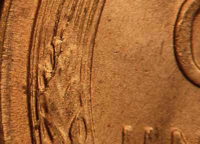 Die-stage B marker on 1954S•1MM•002 (1954 Repunched Mint Mark).
