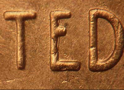 Die-stage B marker on 1954S•1MM•002 (1954 Repunched Mint Mark).