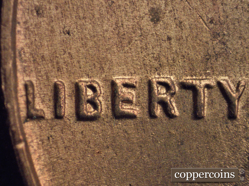 Die-stage B marker on 1954S•1MM•005 (1954 Repunched Mint Mark).