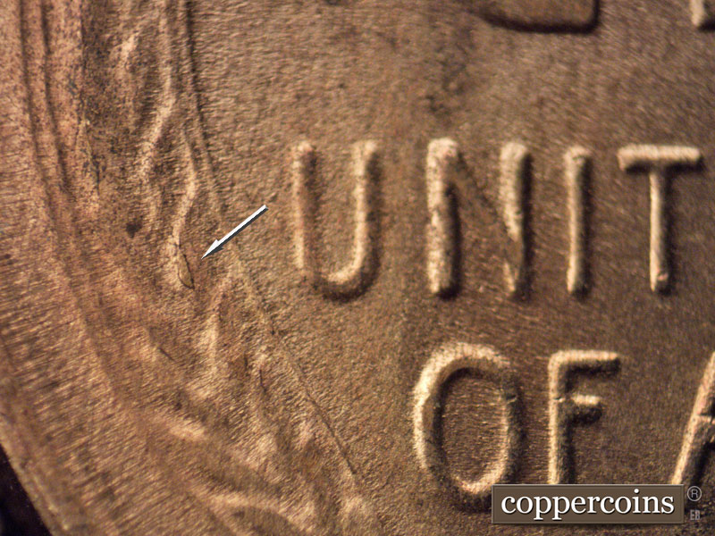 Die-stage B marker on 1954S•1MM•005 (1954 Repunched Mint Mark).