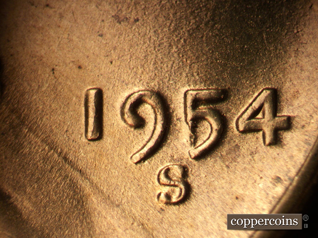 Die-stage D marker on 1954S•1MM•007 showing Die break on 5 in date.