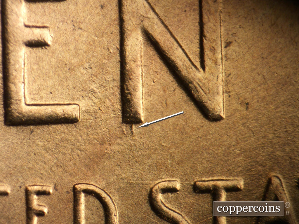 Die-stage D marker on 1954S•1MM•007 showing Heavy die gouge from bottom of N in CENT.