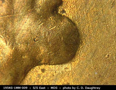 Die-stage B marker on 1954S•1MM•009 (1954 Repunched Mint Mark).