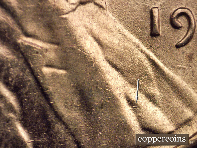Die-stage B marker on 1954S•1MM•015 (1954 Repunched Mint Mark).