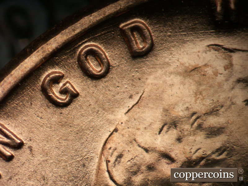 Die-stage A marker on 1955D•1DO•002 (1955 Doubled Die Obverse).