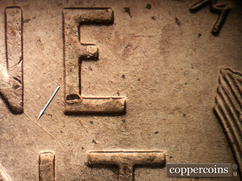 Die-stage A marker on 1955D•1DO•002 (1955 Doubled Die Obverse).