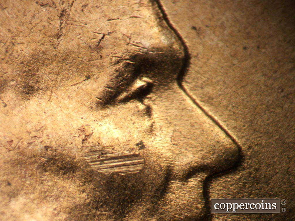 Die-stage C marker on 1955D•1DO•003 showing Extra eyelids south of primary.
