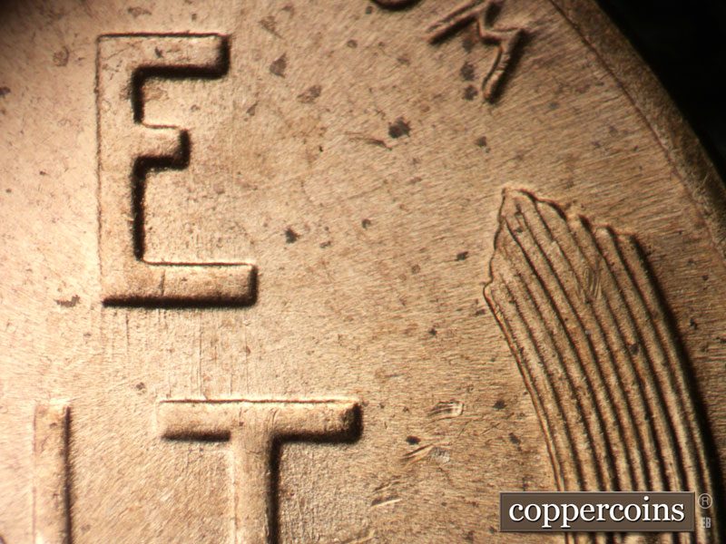 Die-stage A marker on 1955D•1DO•006 (1955 Doubled Die Obverse).