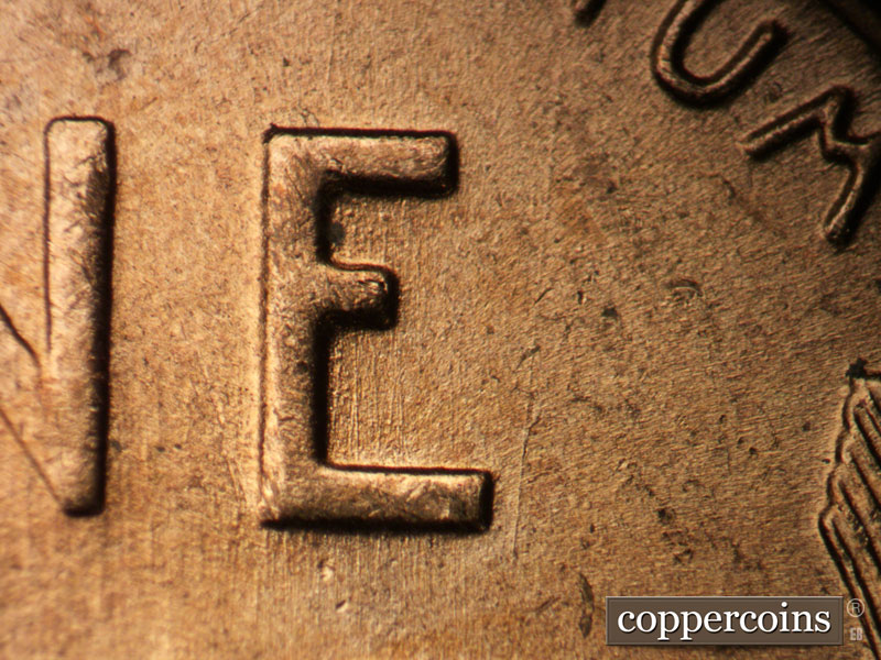 Die-stage B marker on 1955D•1DO•006 (1955 Doubled Die Obverse).