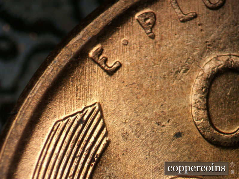 Die-stage B marker on 1955D•1DO•006 (1955 Doubled Die Obverse).