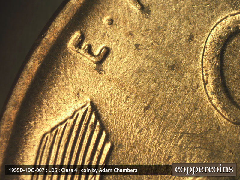Die-stage C marker on 1955D•1DO•007 (1955 Doubled Die Obverse).
