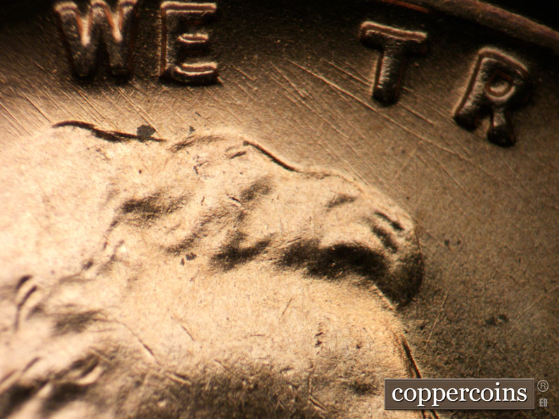 Die-stage B marker on 1955D•1DO•008 (1955 Doubled Die Obverse).
