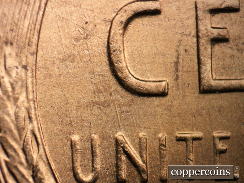 Die-stage B marker on 1955D•1DO•008 (1955 Doubled Die Obverse).