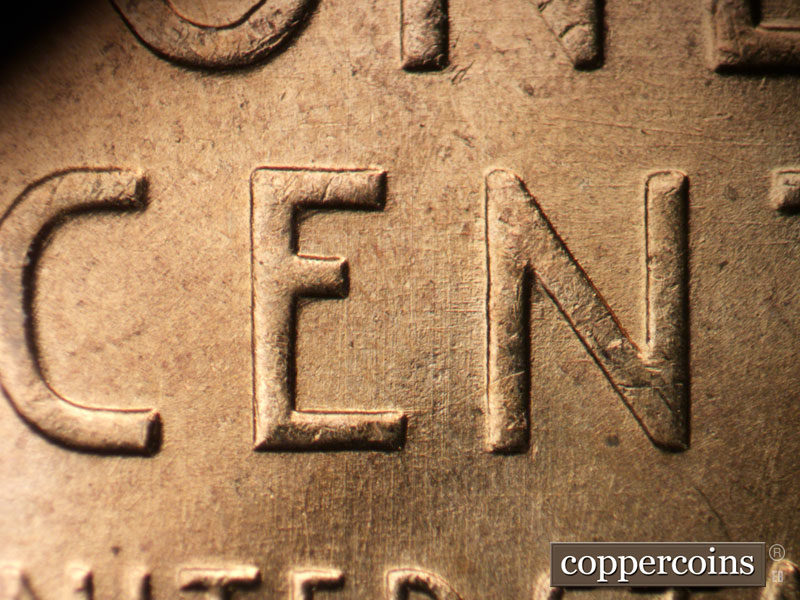 Die-stage B marker on 1955D•1DO•009 (1955 Doubled Die Obverse).