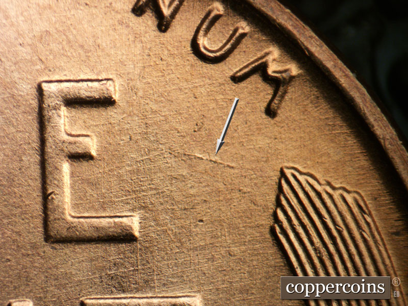 Die-stage B marker on 1955D•1DO•010 (1955 Doubled Die Obverse).