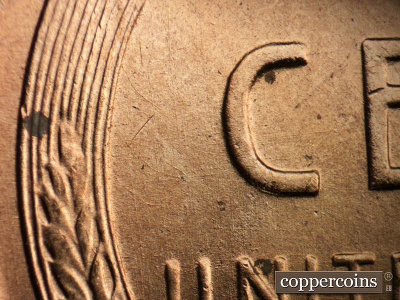 Die-stage B marker on 1955D•1DO•010 (1955 Doubled Die Obverse).
