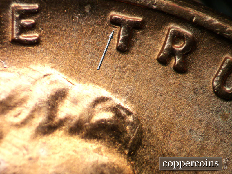 Die-stage B marker on 1955D•1DO•011 (1955 Doubled Die Obverse).